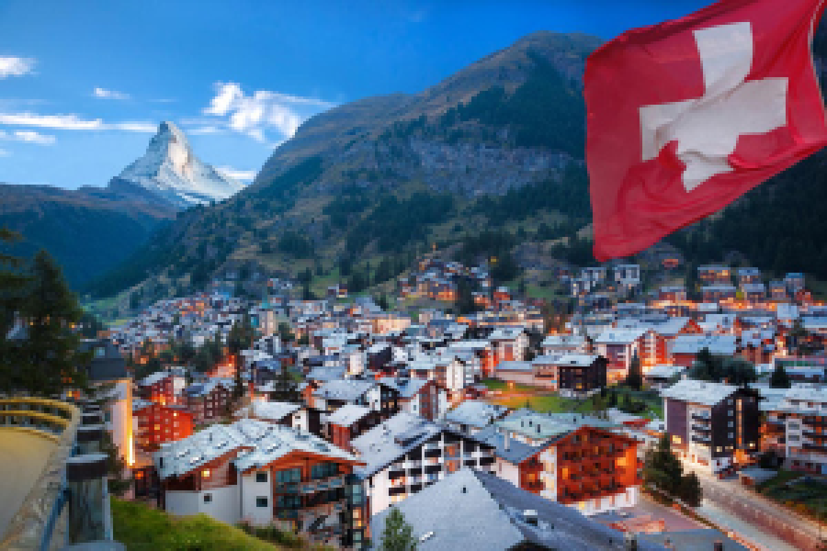 Switzerland Landscape with flag in the foreground 